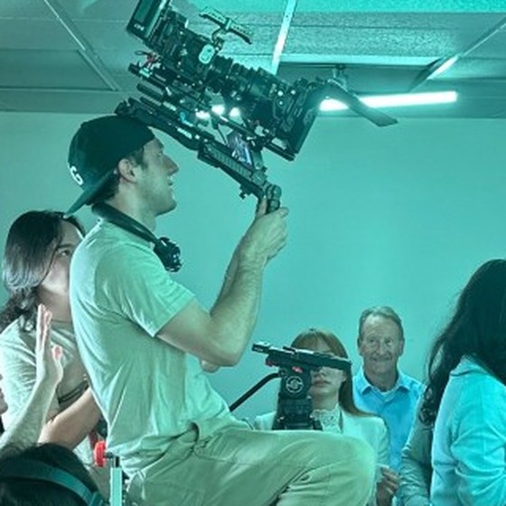 Will Hoppin operating a cinema camera on set